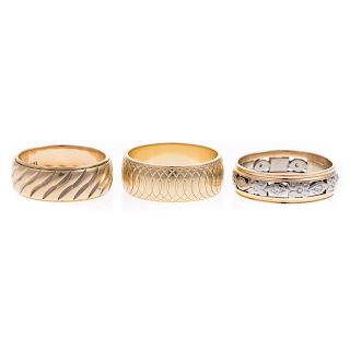A Trio of Ladies Gold Wide Wedding Bands