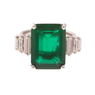 A Ladies Emerald Synthetic & Diamond Ring in 14K