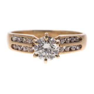 A Ladies Diamond Solitaire Ring in Gold