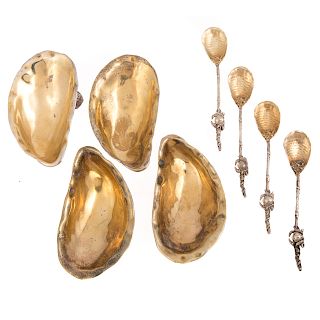 4 Unique gilt silver oyster salts & spoons