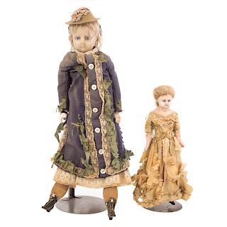 Two wax head dolls with inset glass eyes