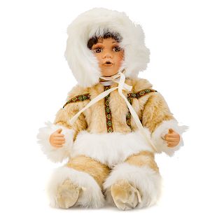 Painted bisque Inuit child doll