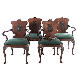 Four Queen Anne style mahogany armchairs