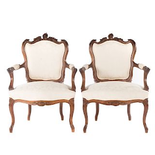 Pair Louis XV style carved beechwood fauteuils