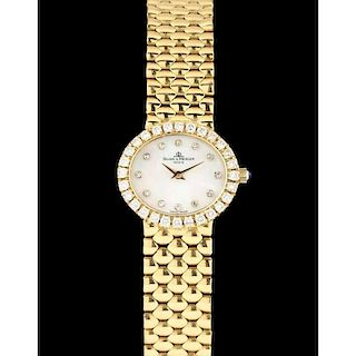 Lady's 18KT and Diamond Watch, Baume and Mercier