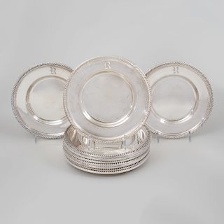 A Set of Twelve Gorham Silver Bread and Butter Dishes