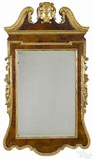 George III style mahogany and parcel gilt mirror, late 19th c., 53'' h.