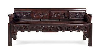 * A Chinese Relief Carved Hardwood Bench Height 31 3/8 x width 71 1/2 x depth 22 3/4 inches.