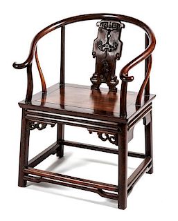 A Carved Hardwood Horseshoe Back Chair Height 35 inches.