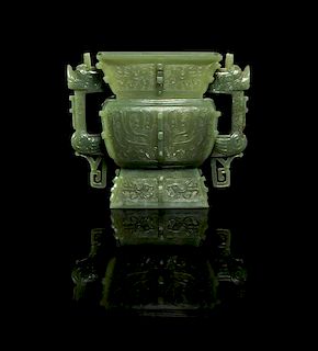 A Jade Archaistic Vase, Fang Zun Height 5 inches.