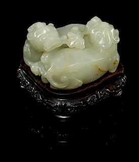 A Pale Celadon Jade Figural Group Height 1 3/4 inches.