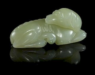 A Carved Jade Figure of a Horse Height 1 3/8 inches.