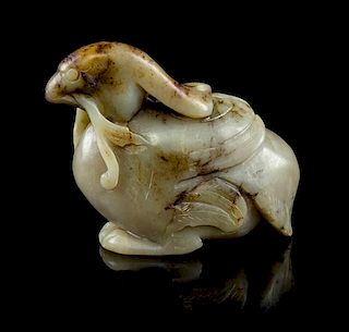 * A Ming Style Jade Carving of a Bird Width 3 inches.
