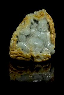 * A Carved Jade Boulder Height of largest 3 1/2 x length 7 1/2 inches.
