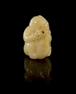 A Carved Jade Figure Height 2 inches.