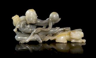 A Black and White Jade Figural Group Width 5 1/8 inches.