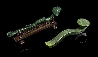 * Two Spinach Jade Ruyi Scepters Length of first 8 1/2 inches.