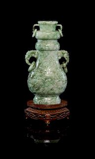 A Jadeite Hu and Cover Height 7 inches.