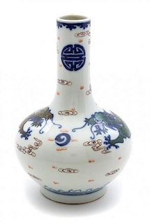 A Blue and White and Famille Rose Porcelain Dragon Vase Height 8 inches.