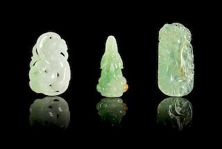 Three Carved Jadeite Pendants Height of tallest 2 1/8 inches.