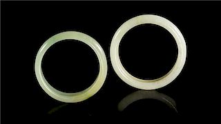 Two Jade Bangles Diameter of largest 2 1/4 inches.