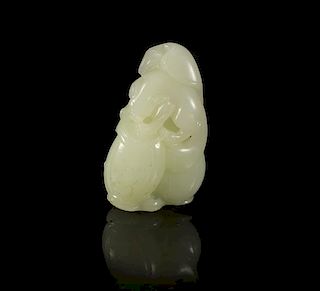 A Carved Jade Toggle of a Badger Height 2 1/2 inches.