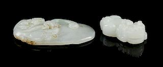 Two Carved White Jade Toggles Width of widest 2 1/4 inches.