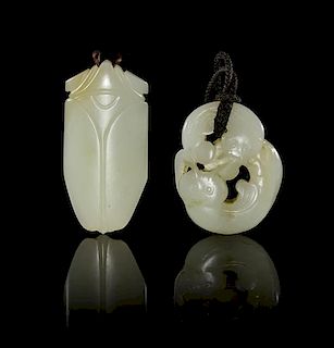 * Two Carved Jade Toggles Height of tallest 2 3/4 inches.