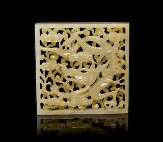 A Reticulated Light Yellow Jade Plaque Height 2 1/8 x width 2 1/8 inches.