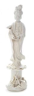 A Blanc-de-Chine Figure of Guanyin Height 12 inches.