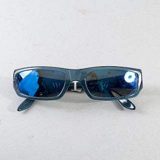 Gafas para sol. Marca Revo. En acetato y cristales azules polarizados, con protección UV. Con guardapolvo. Lote sin reserva.