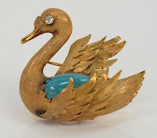 18 karat gold swan brooch, set with cabochon cut blue/green stone and diamond eye, probably French