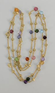 18 karat gold necklace by Marco Bicego "Mini Lollipop" of sapphires and round gold barrels on chain, six colors.
19.9 grams total we...