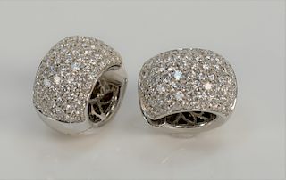Pair of 18 karat white gold and diamond earrings, round form, set with seventy-three diamonds in each, marked: 750, 18 karat.
19.6 g...