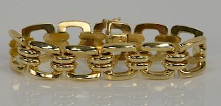 14 karat gold bracelet with square links.
length 7 inches, width 5/8 inch, 27.2 grams