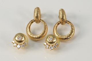 Two pairs of 14 karat gold ear clips to include a double circles of brushed gold and a pair of two part earrings, set with five diam...
