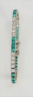 Platinum tennis bracelet, diamonds and synthetic emeralds, alternating sections, set with five each diamonds and five each synthetic...