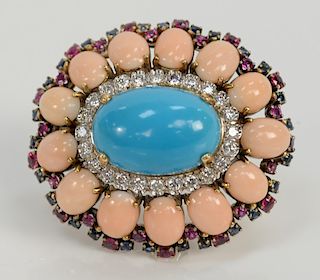 14 karat oval brooch with center cabochon cut turquoise surrounded by twenty-four diamonds with thirteen cabochon cut pink coral sur...