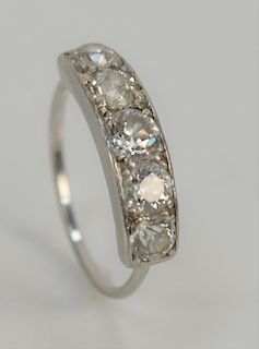 Platinum custom ring, set with five diamonds.
size 6 1/4