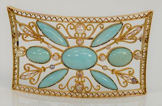 10 karat gold filigree large brooch, set with cabochon cut turquoise and pearls. 
1 3/4" x 3", 27.2 grams total weight