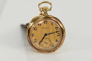 Patek Philippe 18 karat open face pocket watch, marked: made for Henry Kohn & Sons, Htfd, CT, with 18 karat and cloth fob. 
43.9 mm