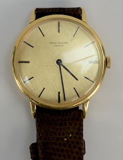 18 karat Patek Philippe mens wristwatch.  32mm