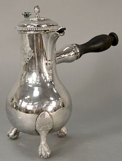Silver teapot with large wood side handle, on shell and paw feet, probably Continental. 
height 11 1/2 inches, 33.8 troy ounces