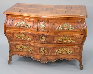 Louis XV bombe commode having shaped sectioned top,  over two carved drawers over two carved drawers, with secret compartment in top...