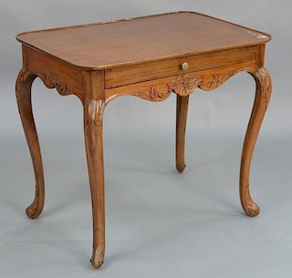 Louis XV table, rectangular dished top over drawer and carved frieze, set on carved cabriole legs, 18th century. 
height 27 1/2 inch...