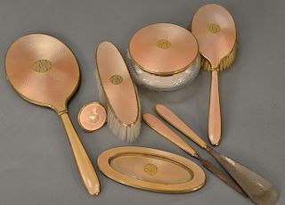 14 karat gold eight piece enameled dresser set to include two brushes, mirror, covered crystal powder jar, comb, shoe horn, boot hoo...