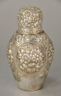 Tiffany & Co. tea caddy jar with repousse body and cover, marked: Tiffany & Co. 3683m 5301 sterling silver, monogrammed. 
height 6 1...