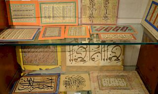 Group of fourteen assorted Persian Arabic illuminated script leaves, gilt gold painted calligraphic panels, possibly in Nasta'liq, f...