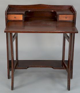 Stickley drop front desk,  having two drawers over lift-top front with swing legs