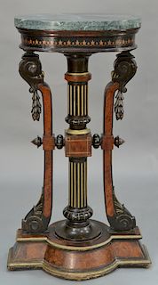 Renaissance Revival pedestal with oval marble top,  over star inlaid structure on center column and scrolled supports, set on burled...